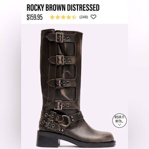 The ROCKY features a harness and buckle giving the design an adjustable fit.